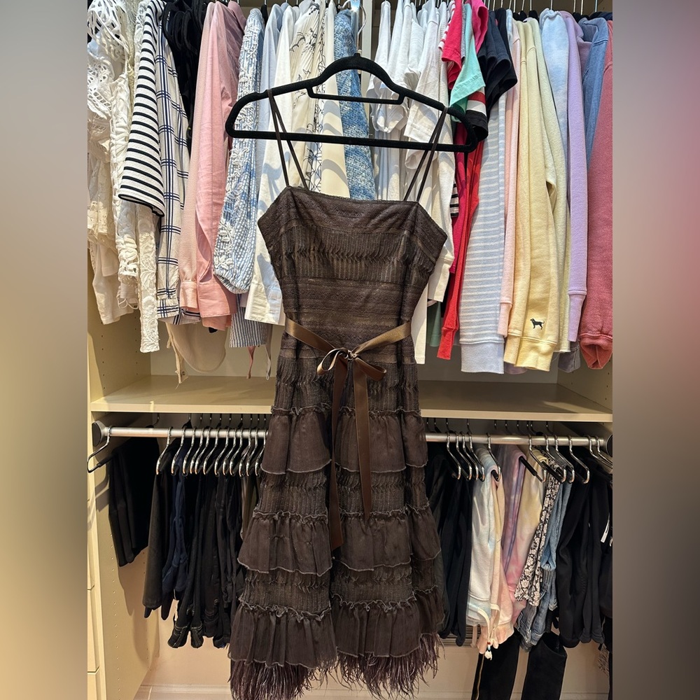 Strapless BCBG Max Axria lace gown with ostrich feather trimming.